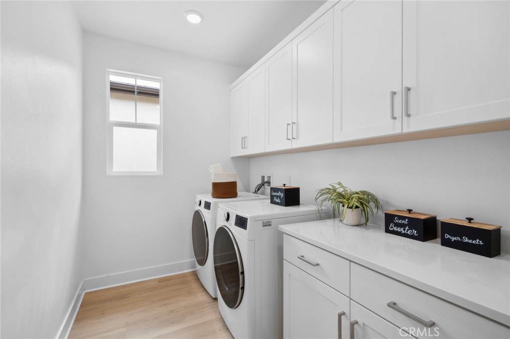 113 Bosal Irvine, CA 92618 - Photo 31 of 63 a utility room with sink dryer and washer