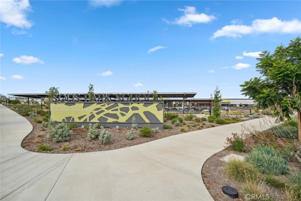 113 Bosal Irvine, CA 92618 - Photo 36 of 63 a view of a swimming pool with a table and chairs