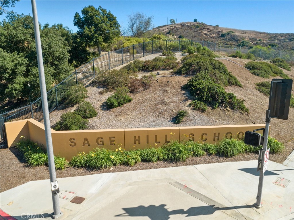 113 Bosal Irvine, CA 92618 - Photo 39 of 63 an aerial view of a house with a yard and large tree