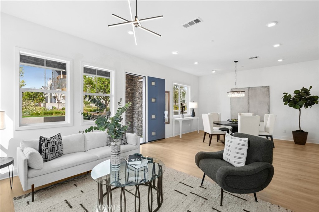 113 Bosal Irvine, CA 92618 - Photo 5 of 63 a living room with furniture and a large window