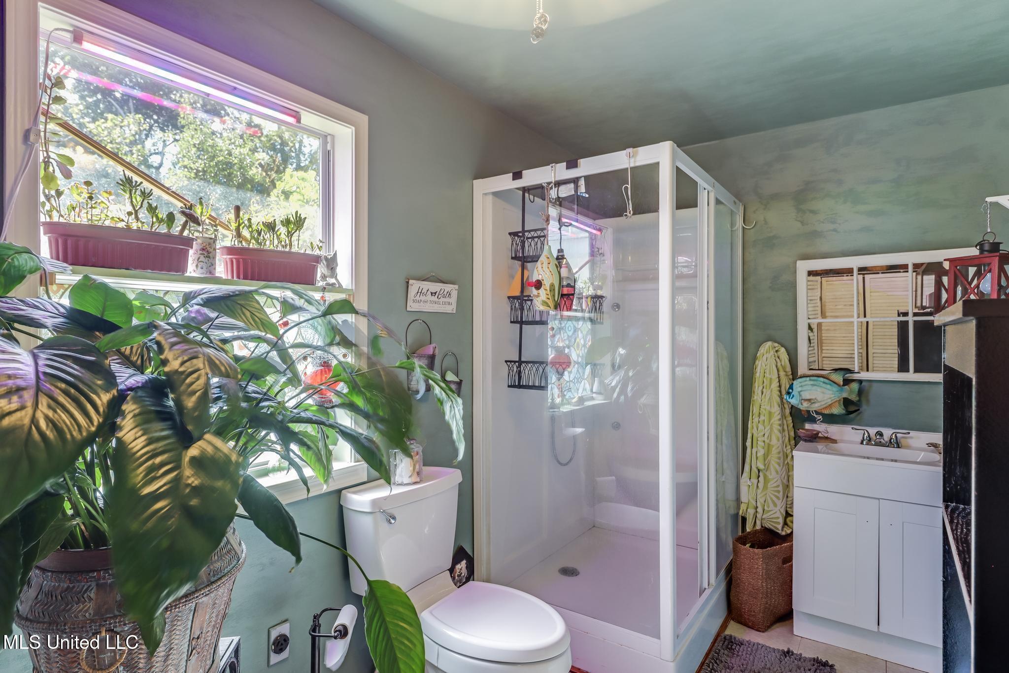 14160 John Clark Road Gulfport, MS 39503 - Photo 22 of 29 Second bathroom/Utility Room