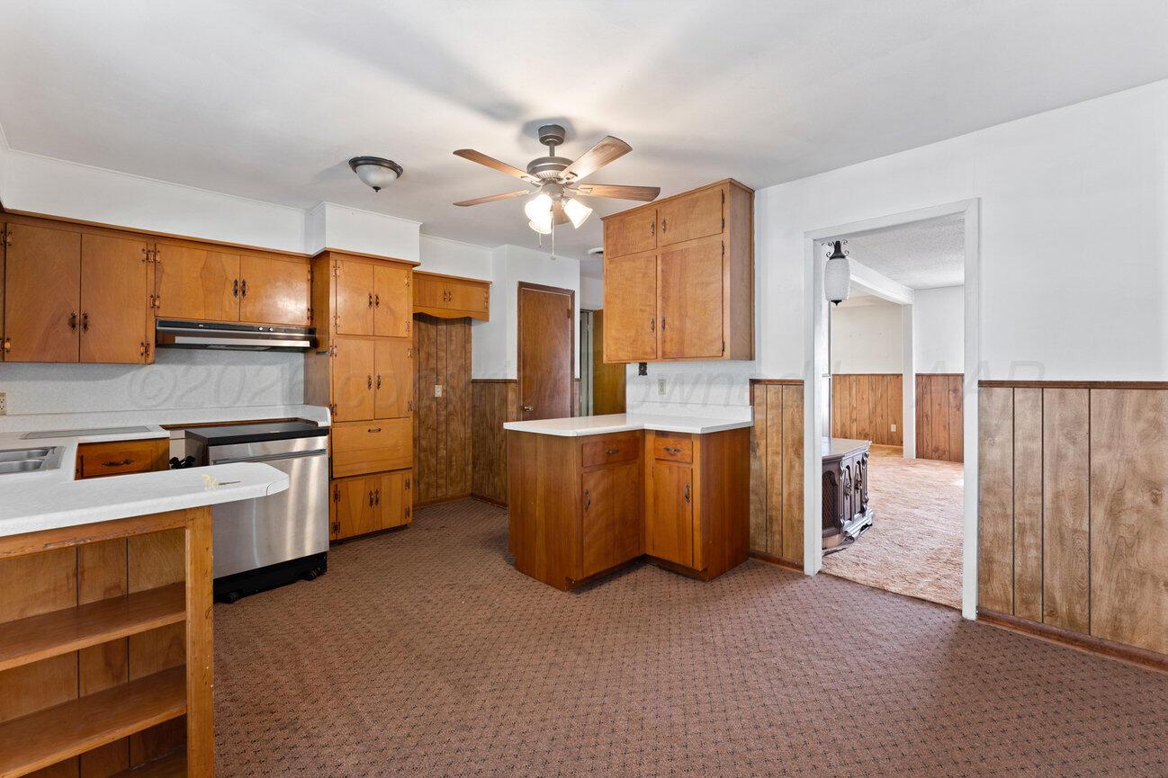 4305 South Bonham Street Amarillo, TX 79110 - Photo 18 of 48 a large kitchen with a large counter top appliances