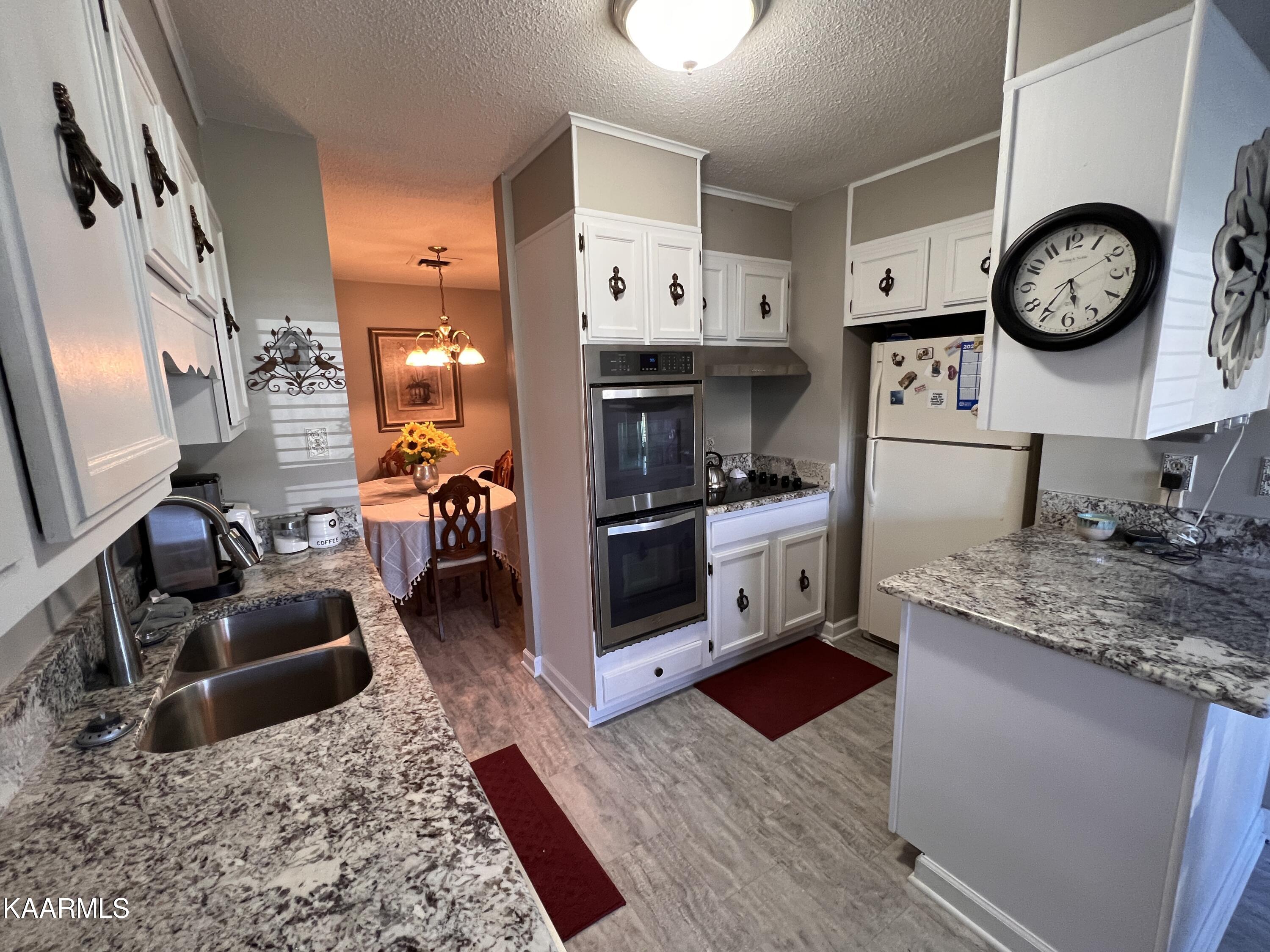 7244 Deville Way Powell, TN 37849 - Photo 12 of 27 875D4D12-7C6B-48CF-BC46-2AE128994C44