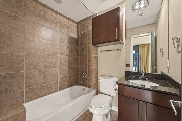 a view of storage and utility room with racks on the wall