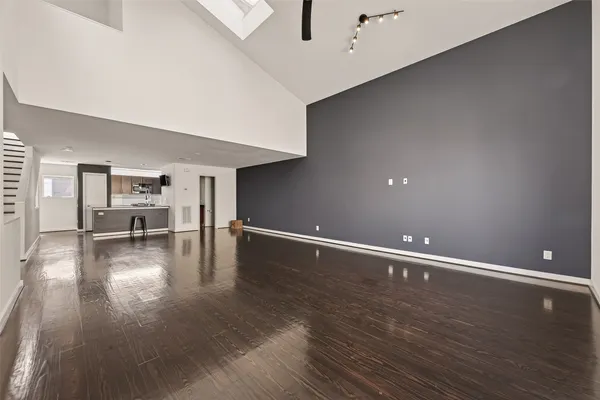 a view of a livingroom with wooden floor