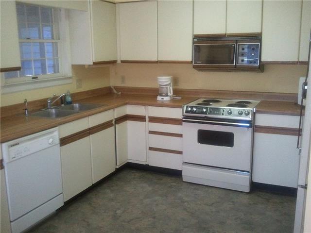 1345 Ingman Road Tracy City, TN 37387 - Photo 10 of 19 The spacious eat-in kitchen allows for entertaining