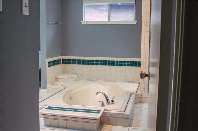 a bathroom with a bathtub