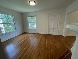 1305 East 28th Street, Unit A Austin, TX 78722 - Photo 6 of 15 Entrance foyer with dark wood finished floors and baseboards