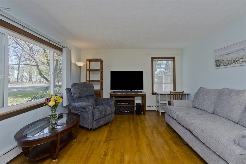 460 James Street Chicopee, MA 01020 - Photo 11 of 34 a living room with furniture and a flat screen tv