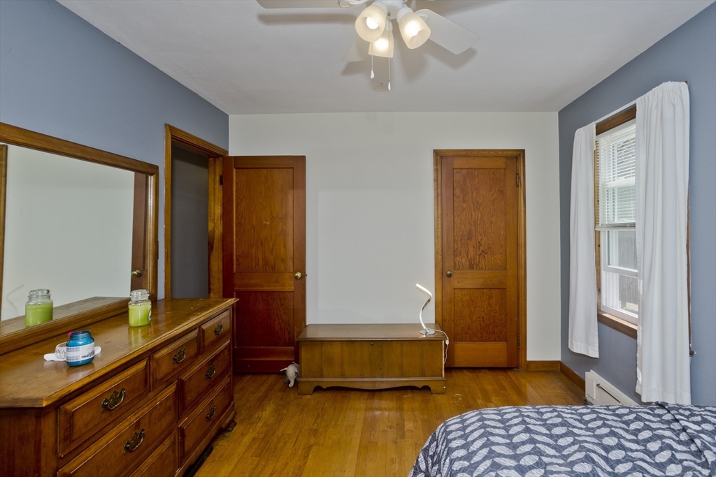 460 James Street Chicopee, MA 01020 - Photo 12 of 34 a bedroom with a bed and a dresser