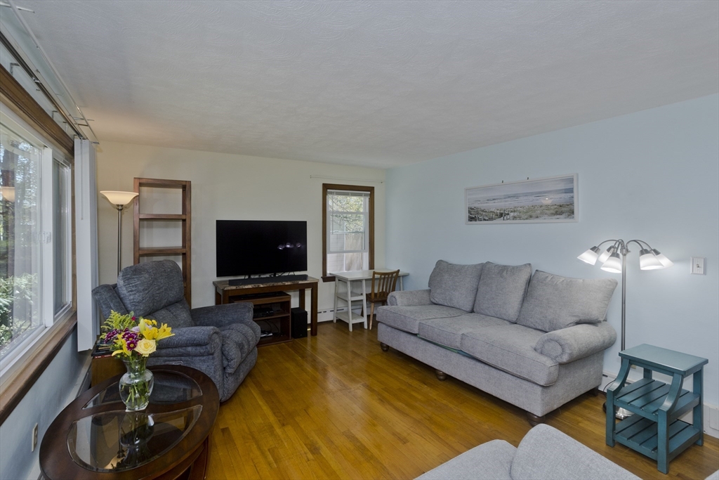 460 James Street Chicopee, MA 01020 - Photo 14 of 34 a living room with furniture and a flat screen tv