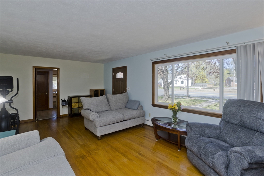460 James Street Chicopee, MA 01020 - Photo 15 of 34 a living room with furniture and a large window