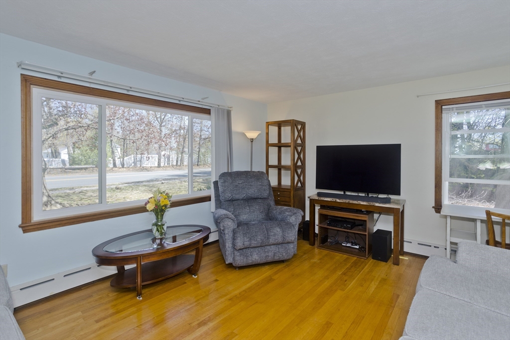 460 James Street Chicopee, MA 01020 - Photo 17 of 34 a living room with furniture and a flat screen tv