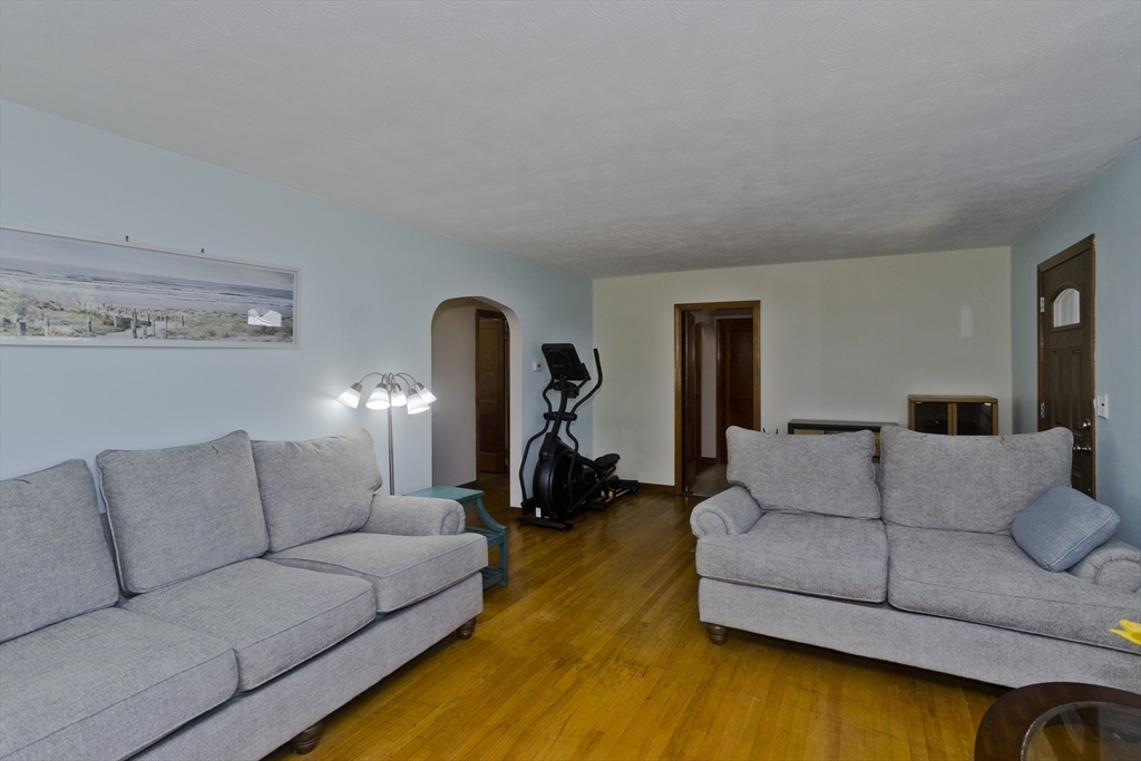 460 James Street Chicopee, MA 01020 - Photo 18 of 34 a living room with furniture and a wooden floor