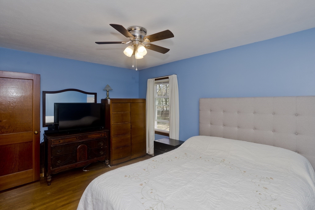 460 James Street Chicopee, MA 01020 - Photo 19 of 34 a bedroom with a bed and a flat screen tv