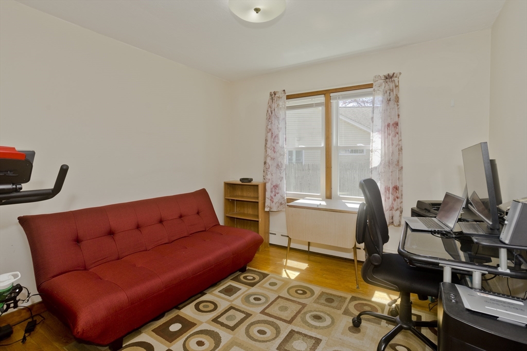 460 James Street Chicopee, MA 01020 - Photo 25 of 34 a living room with furniture and a window