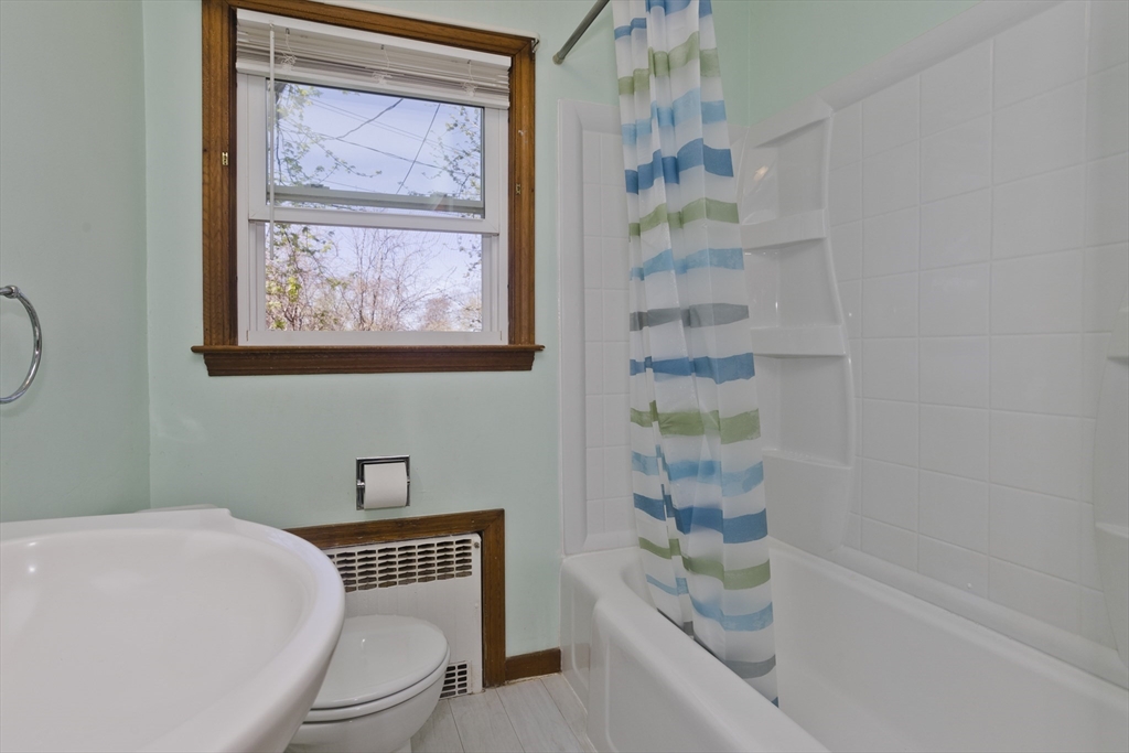 460 James Street Chicopee, MA 01020 - Photo 29 of 34 a bathroom with a bathtub and shower