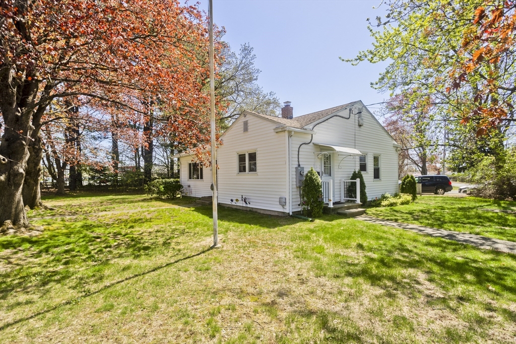 460 James Street Chicopee, MA 01020 - Photo 30 of 34 a view of a house with backyard and tree