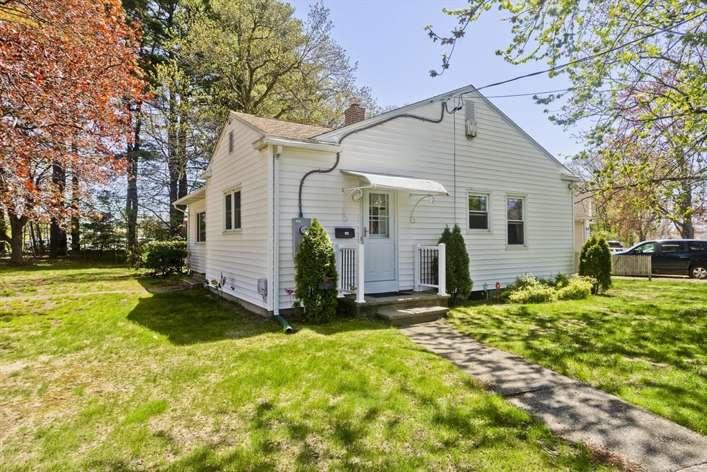 460 James Street Chicopee, MA 01020 - Photo 4 of 34 a view of a house with a yard