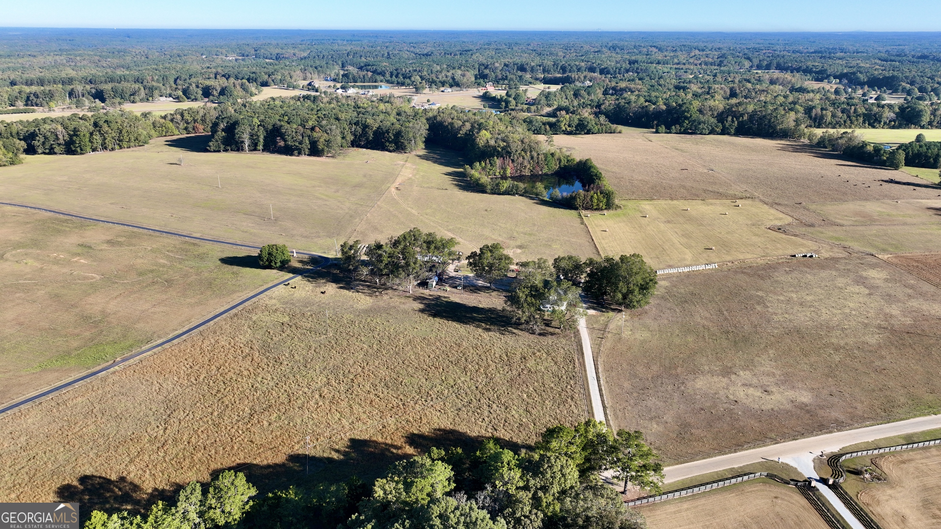 Lot 6 Mask Road Brooks, GA 30205 - Photo 4 of 10 an aerial view of a house with a yard