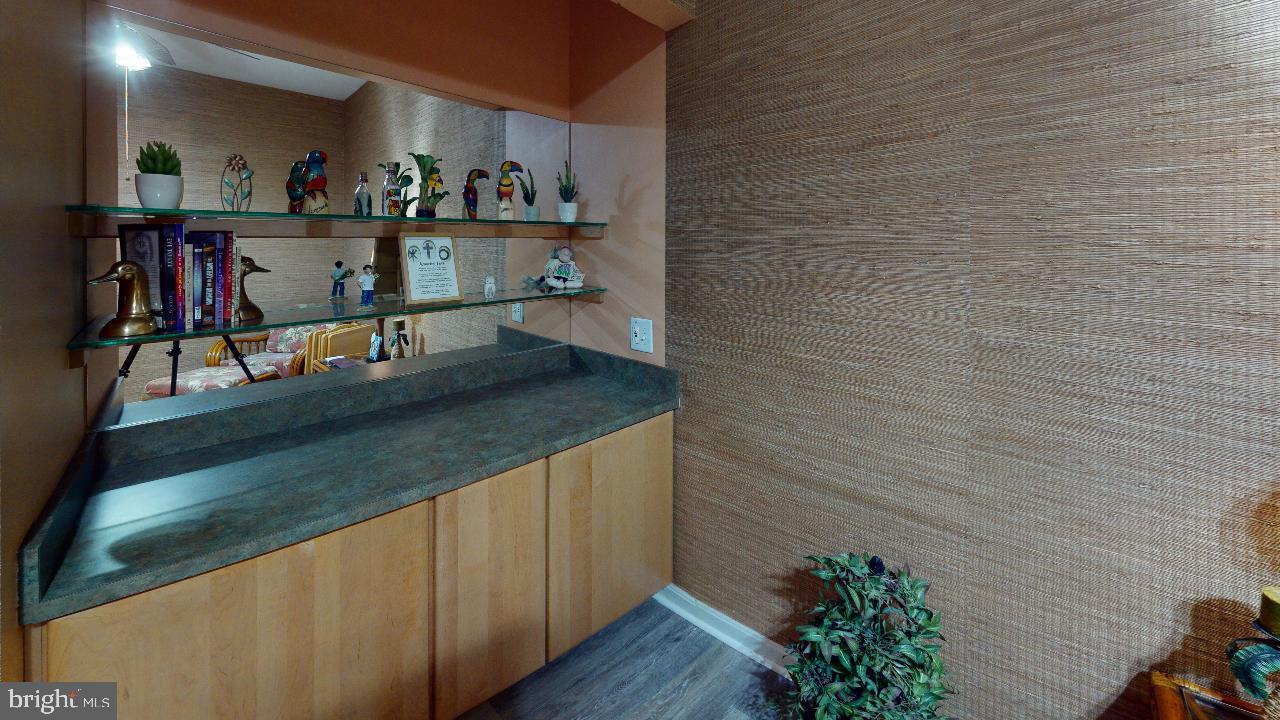 8601 Roaming Ridge Way, Unit 105 Odenton, MD 21113 - Photo 19 of 50 Built in cabinet stays