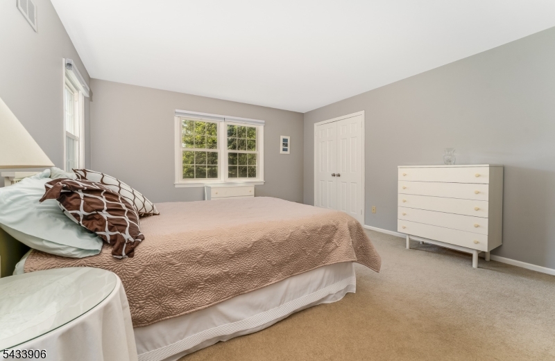14 Lexington Road Annandale, NJ 08801 - Photo 24 of 47 a bedroom with a bed and a window