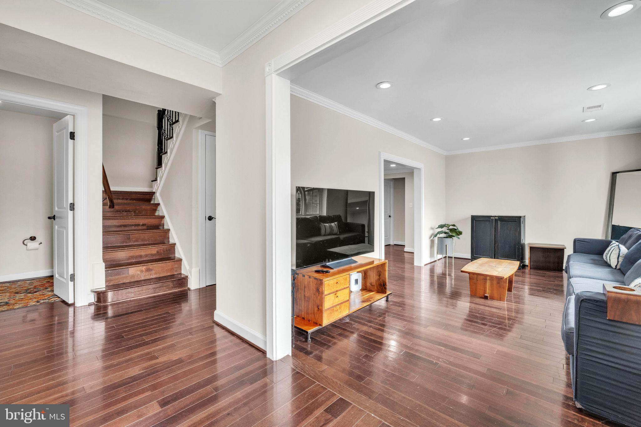 5255 Pumphrey Drive Fairfax, VA 22032 - Photo 13 of 38 a living room with furniture wooden floor and a flat screen tv