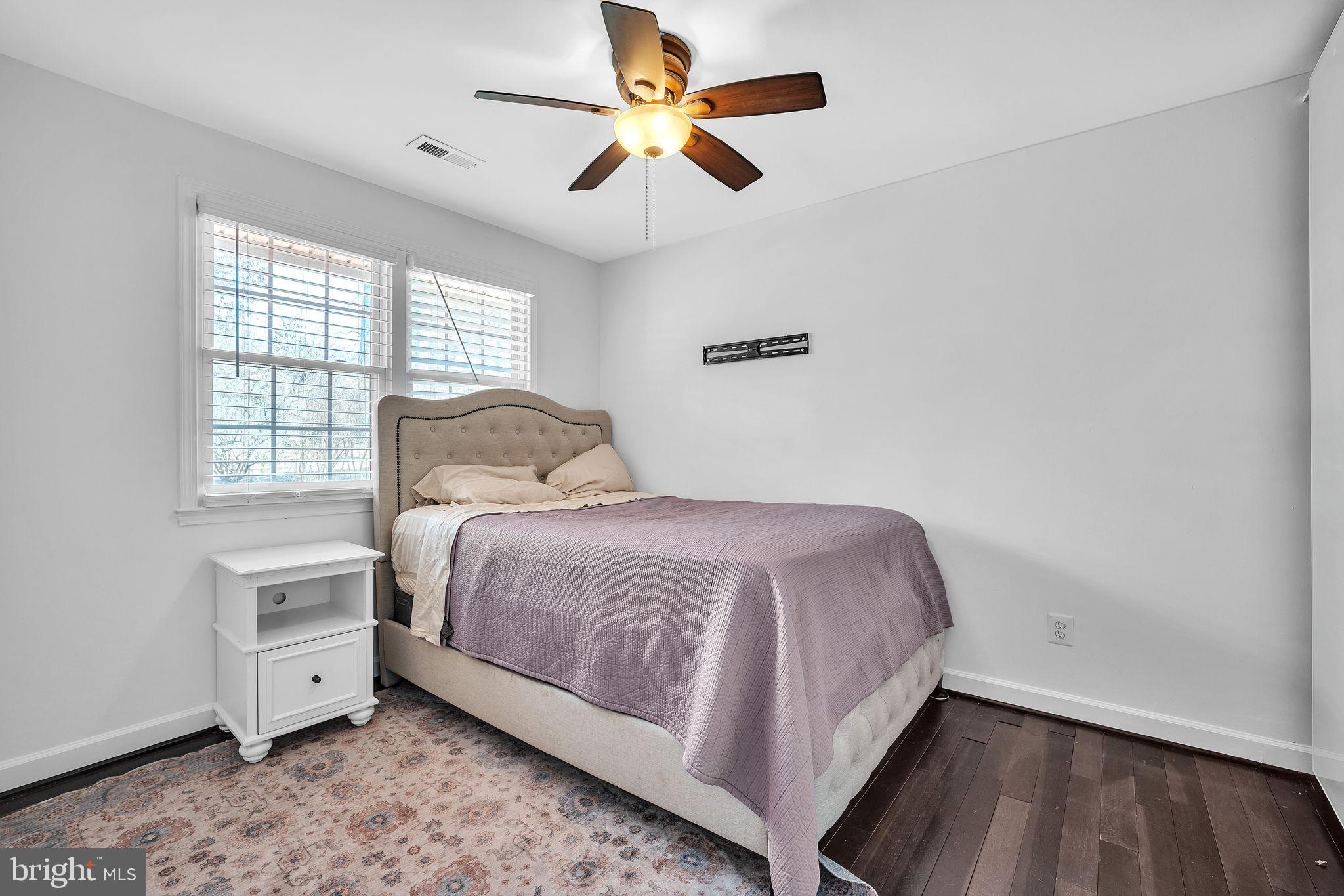 5255 Pumphrey Drive Fairfax, VA 22032 - Photo 15 of 38 a bedroom with a bed and a window