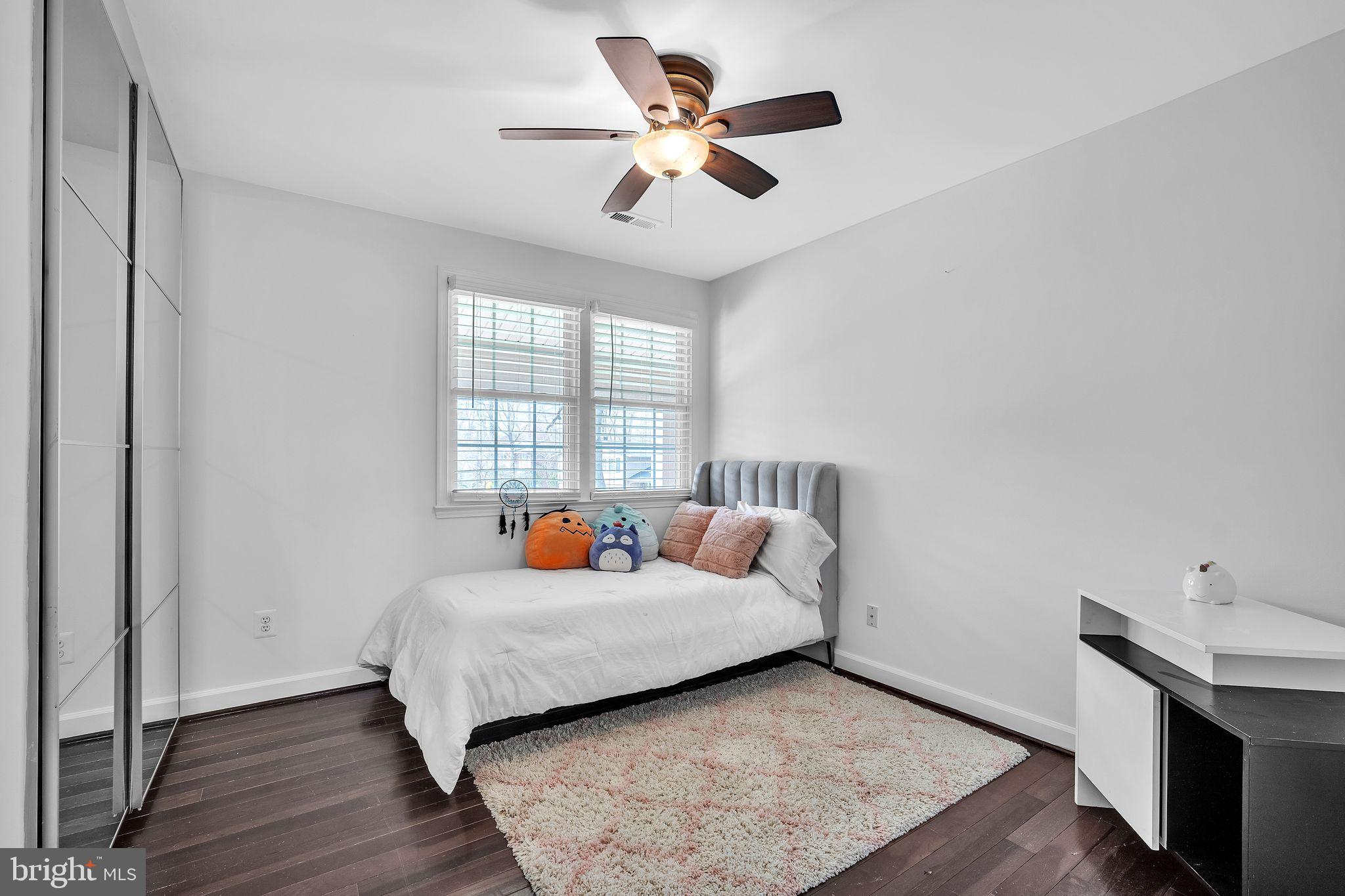 5255 Pumphrey Drive Fairfax, VA 22032 - Photo 18 of 38 a bedroom with a bed and window