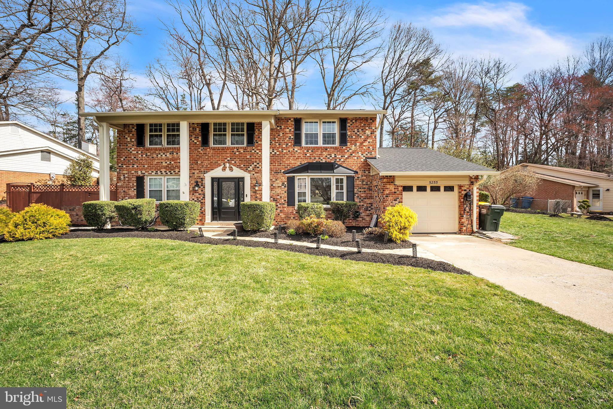5255 Pumphrey Drive Fairfax, VA 22032 - Photo 2 of 38 a view of a house with a yard patio and fire pit
