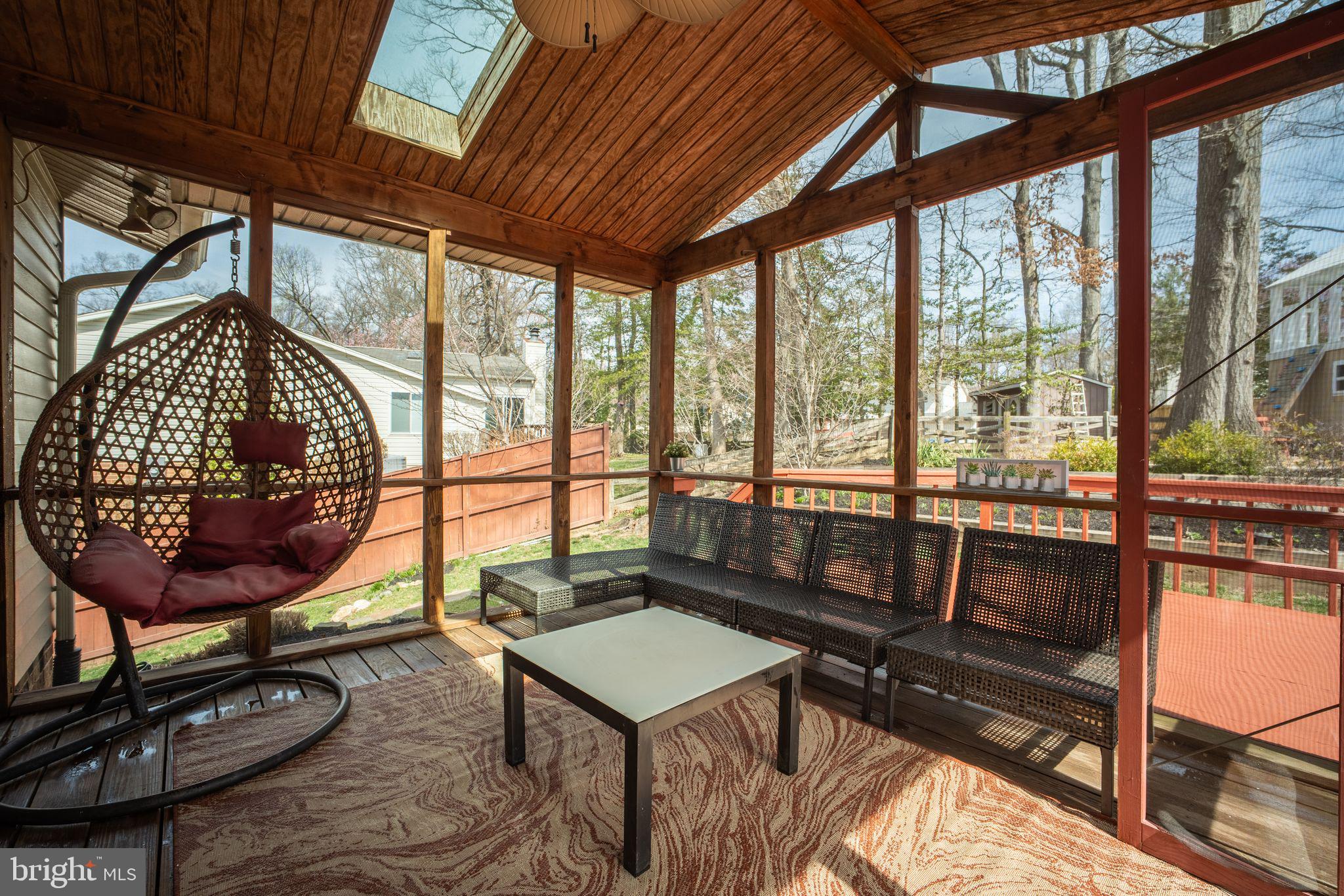 5255 Pumphrey Drive Fairfax, VA 22032 - Photo 27 of 38 a living room with furniture and a floor to ceiling window