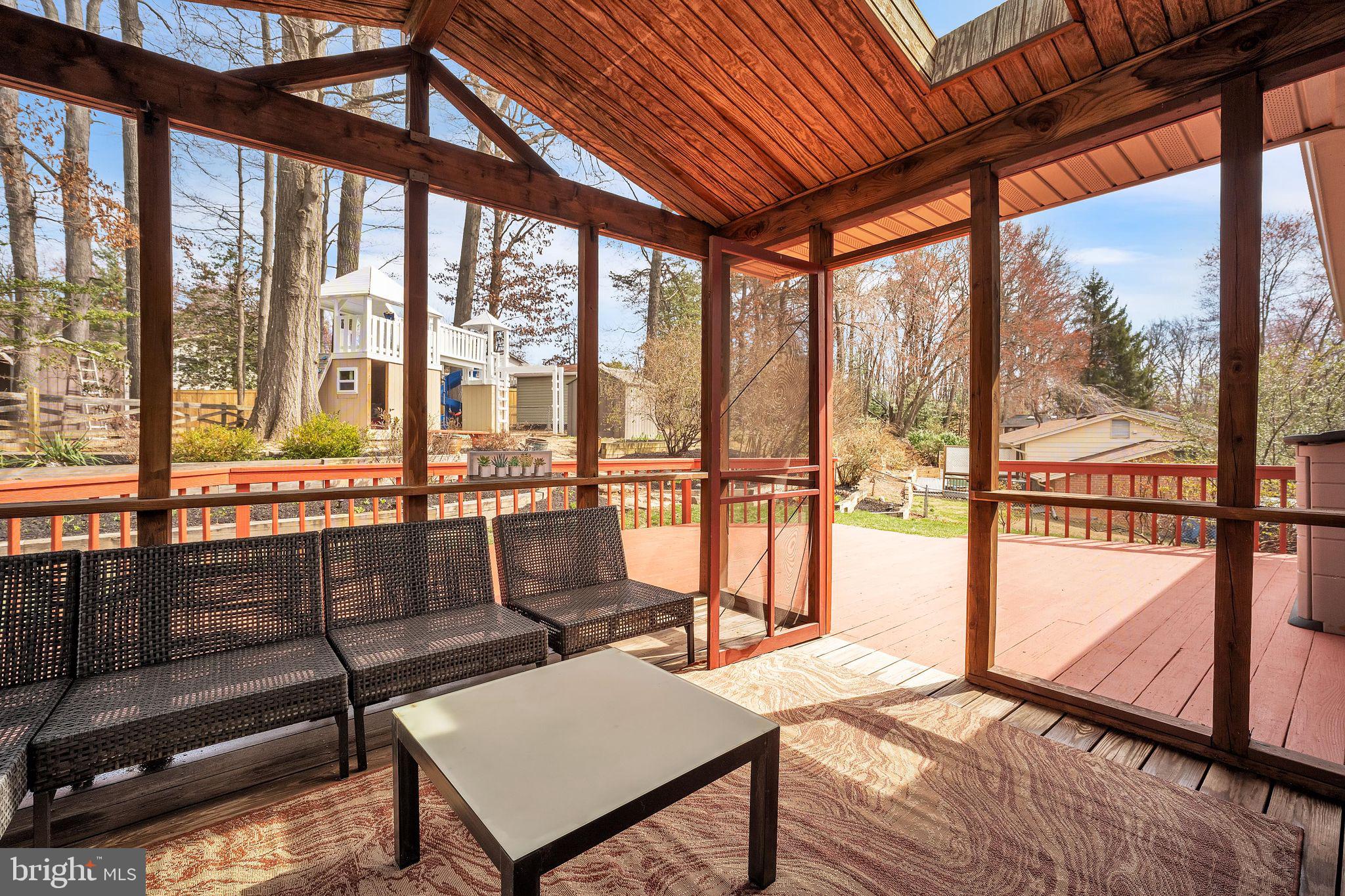 5255 Pumphrey Drive Fairfax, VA 22032 - Photo 28 of 38 a living room with furniture and a floor to ceiling window
