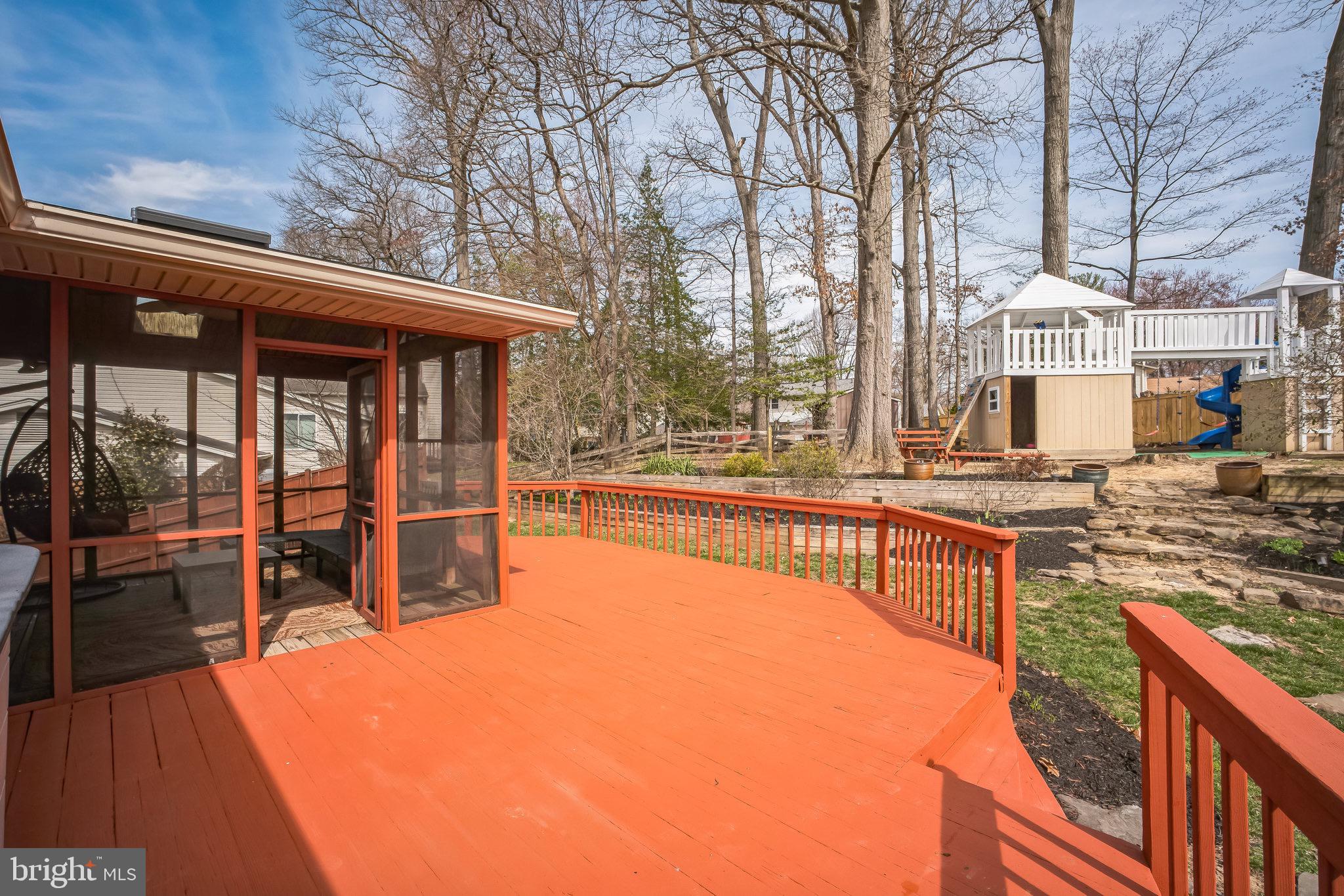 5255 Pumphrey Drive Fairfax, VA 22032 - Photo 30 of 38 a view of a swimming pool with a patio and wooden fence