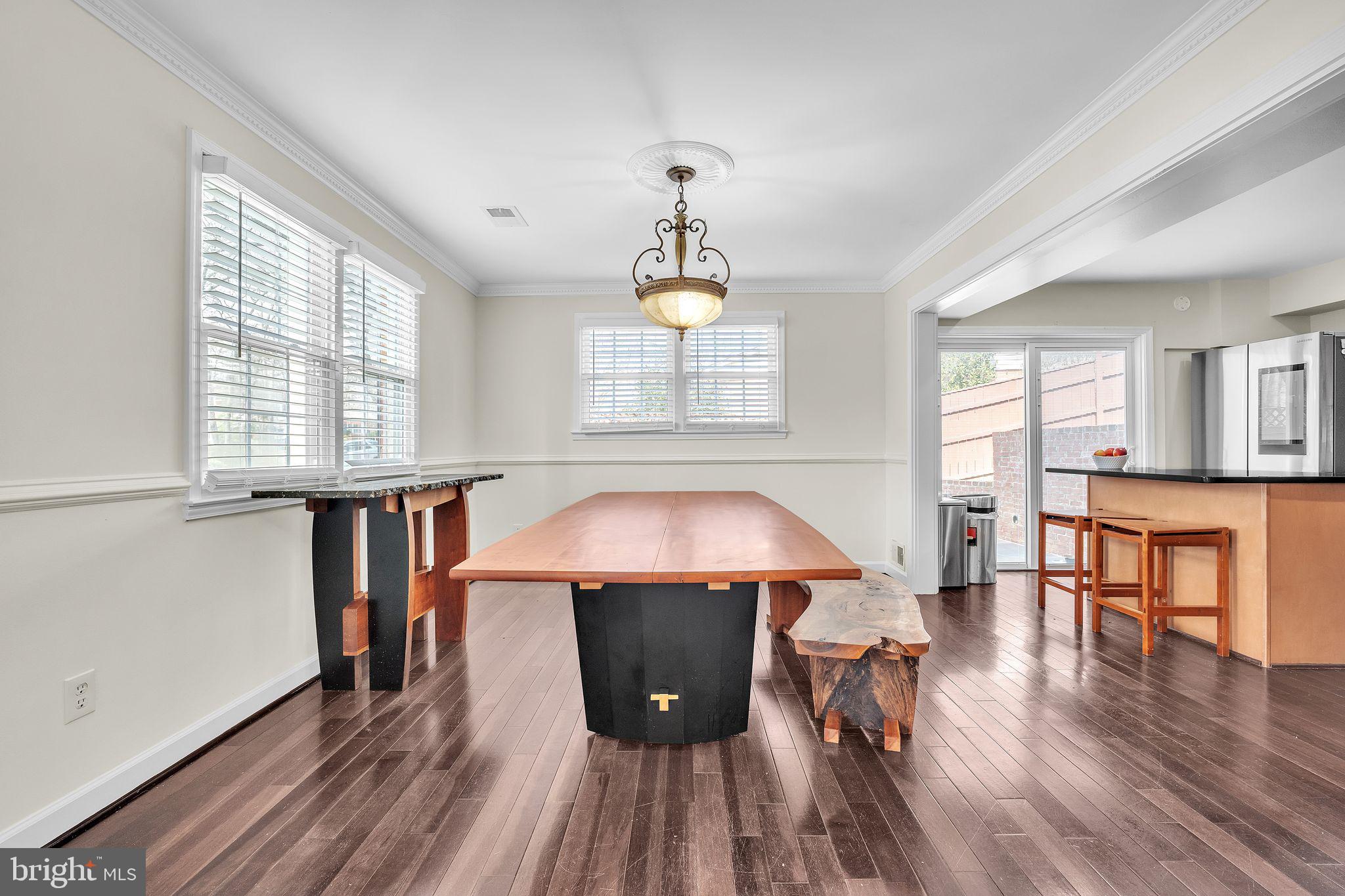 5255 Pumphrey Drive Fairfax, VA 22032 - Photo 9 of 38 a room with wooden floors and windows