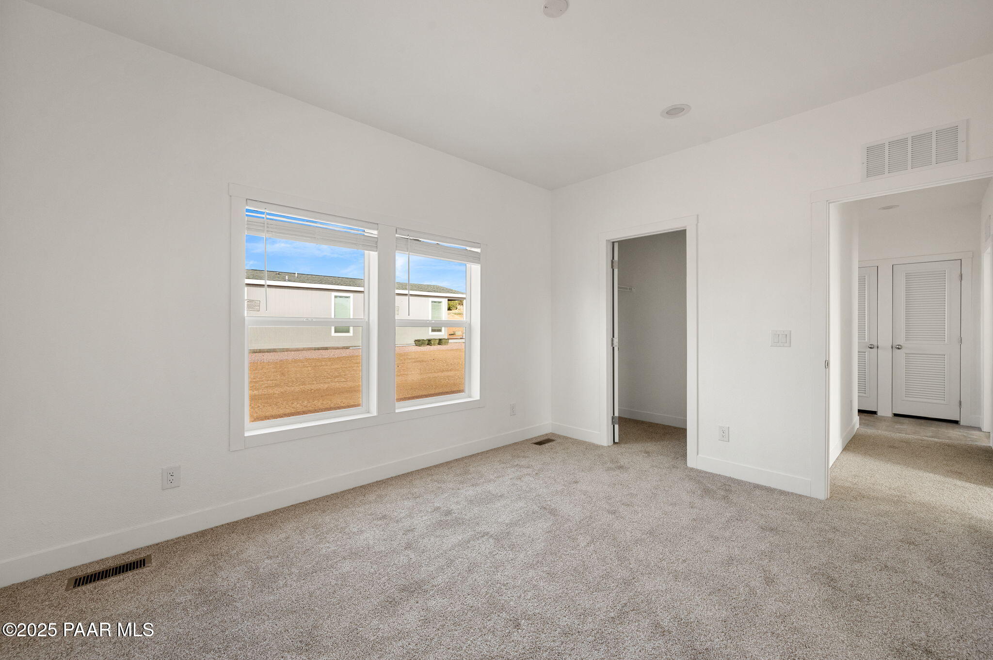 29 East Abra Road Paulden, AZ 86334 - Photo 12 of 22 an empty room with windows