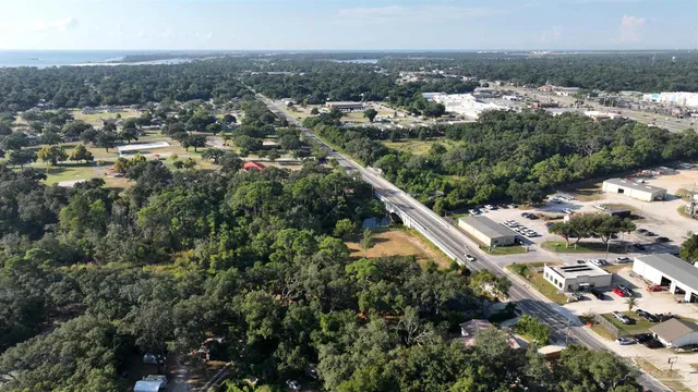 a view of a trees in front of a house