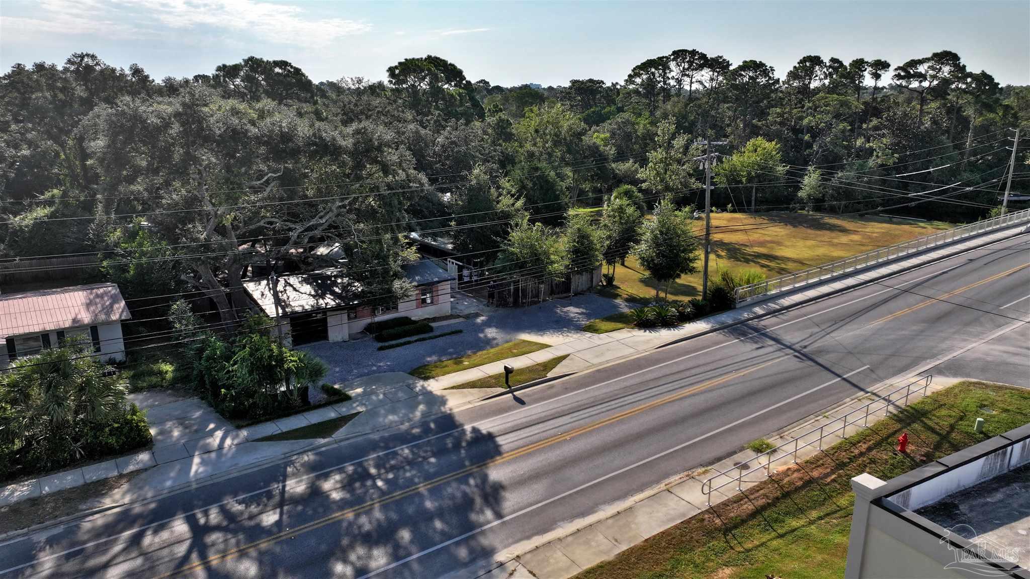 610 South Old Corry Field Road Pensacola, FL 32507 - Photo 19 of 72 an aerial view of a house with a yard