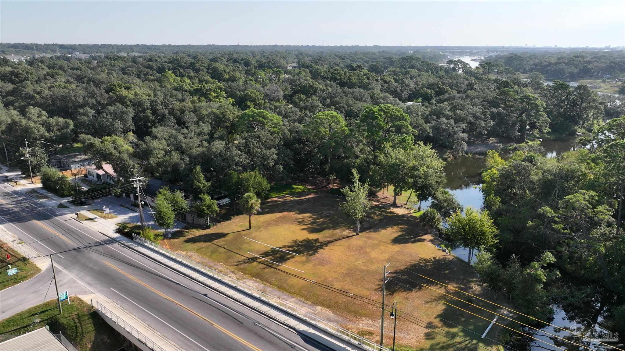 610 South Old Corry Field Road Pensacola, FL 32507 - Photo 22 of 72 a view of a backyard of a house