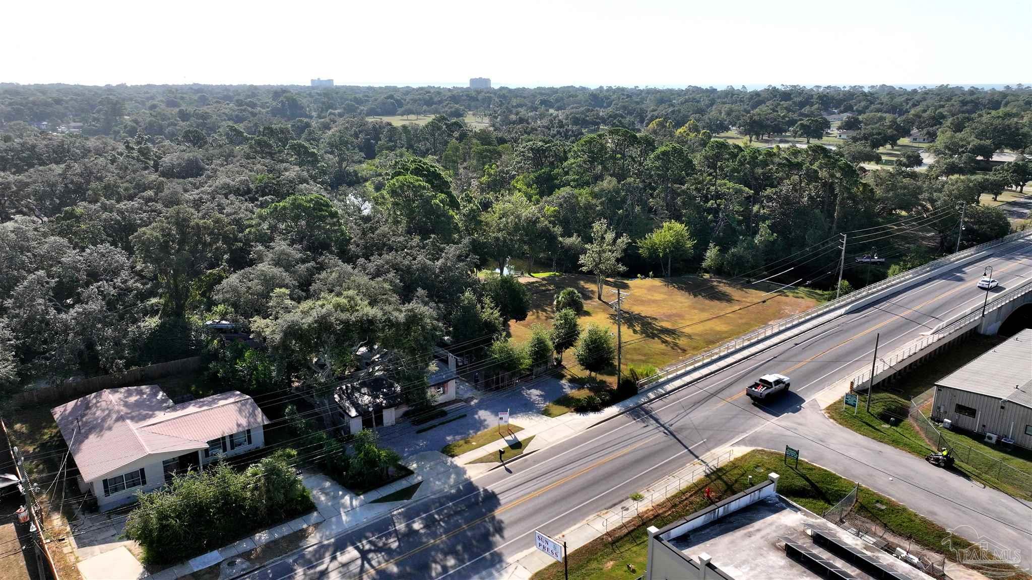 610 South Old Corry Field Road Pensacola, FL 32507 - Photo 28 of 72 an aerial view of residential houses and outdoor space
