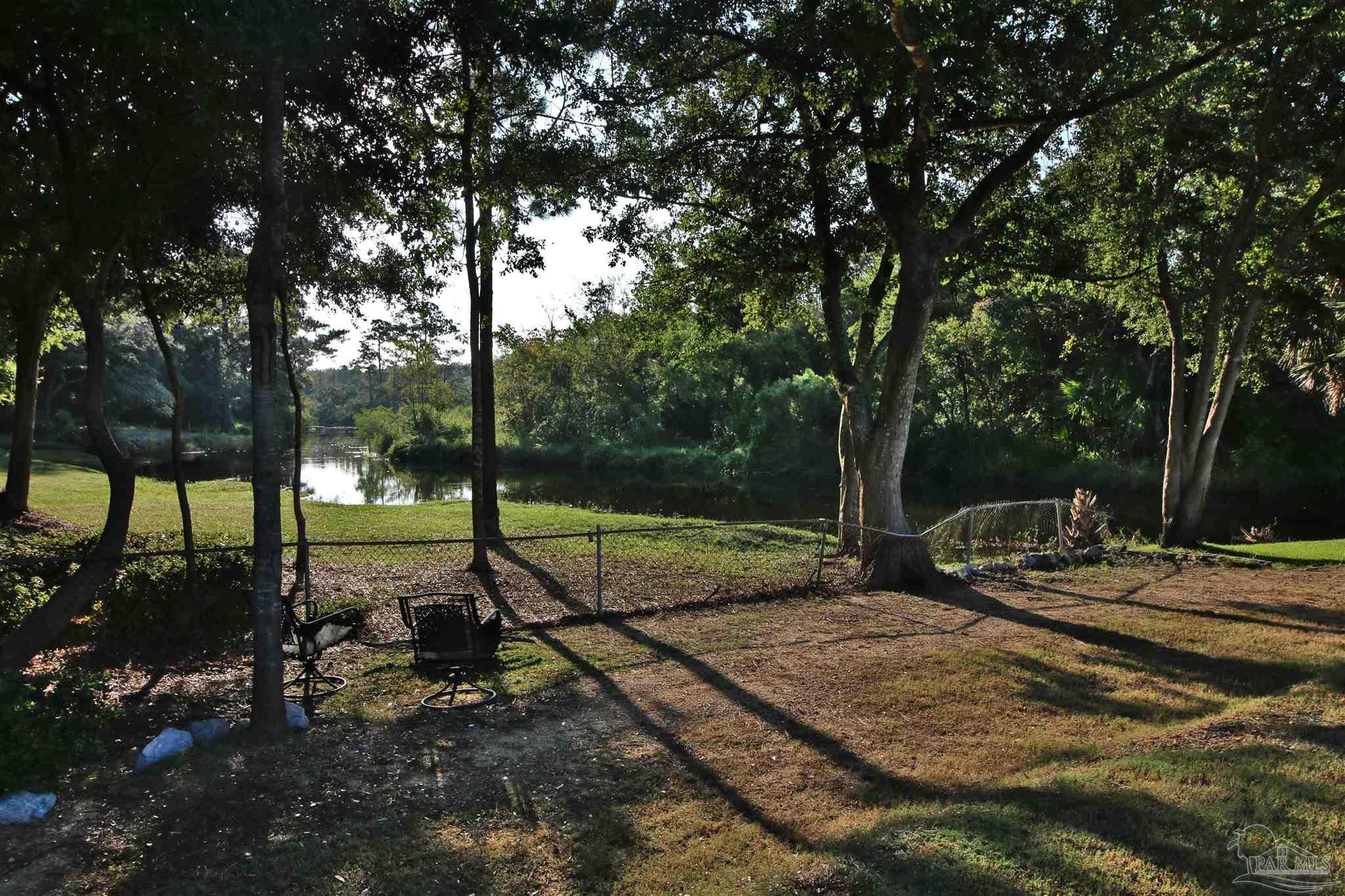 610 South Old Corry Field Road Pensacola, FL 32507 - Photo 37 of 72 a view of a park with large trees