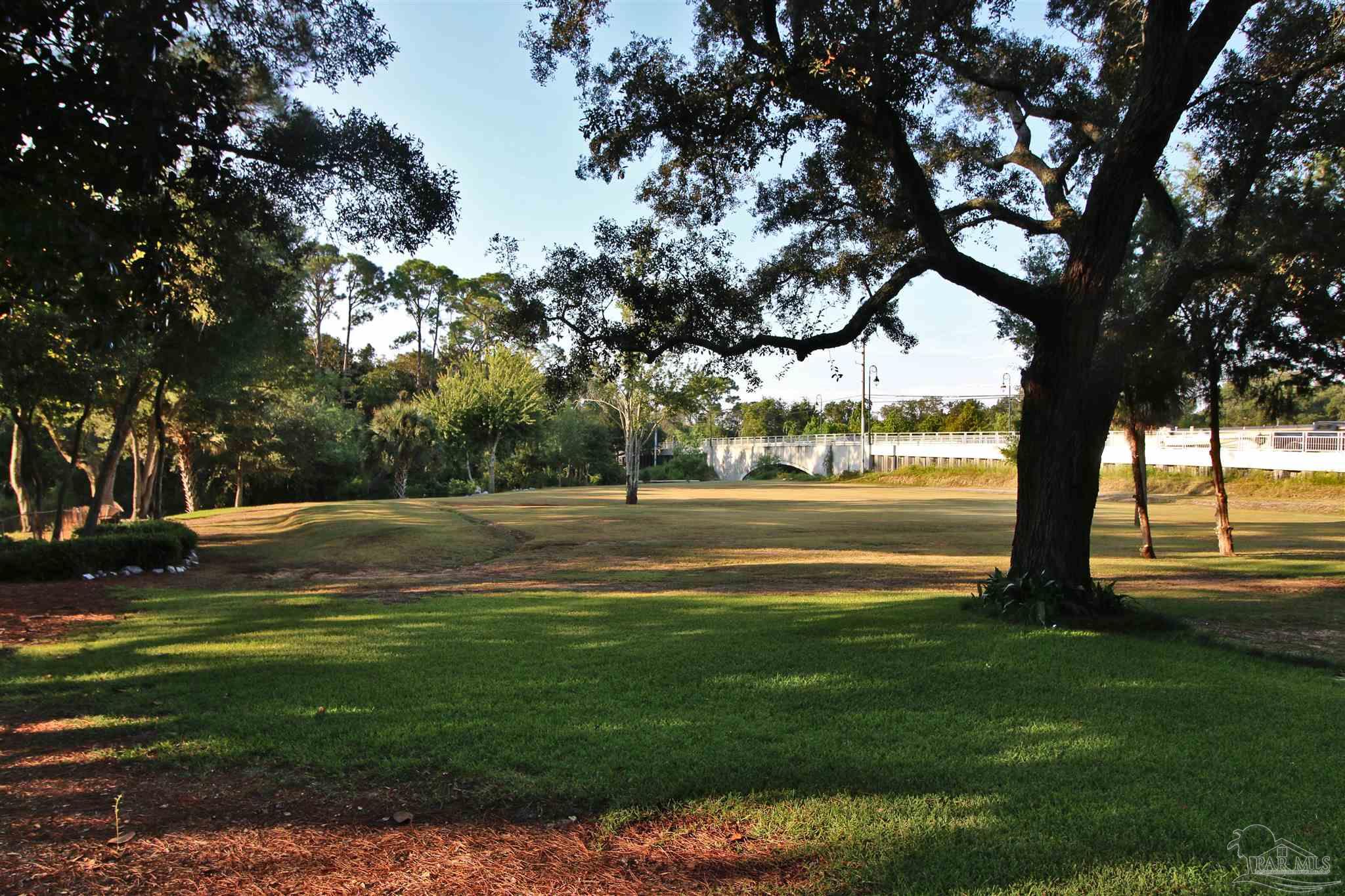 610 South Old Corry Field Road Pensacola, FL 32507 - Photo 42 of 72 a view of lake with a big yard