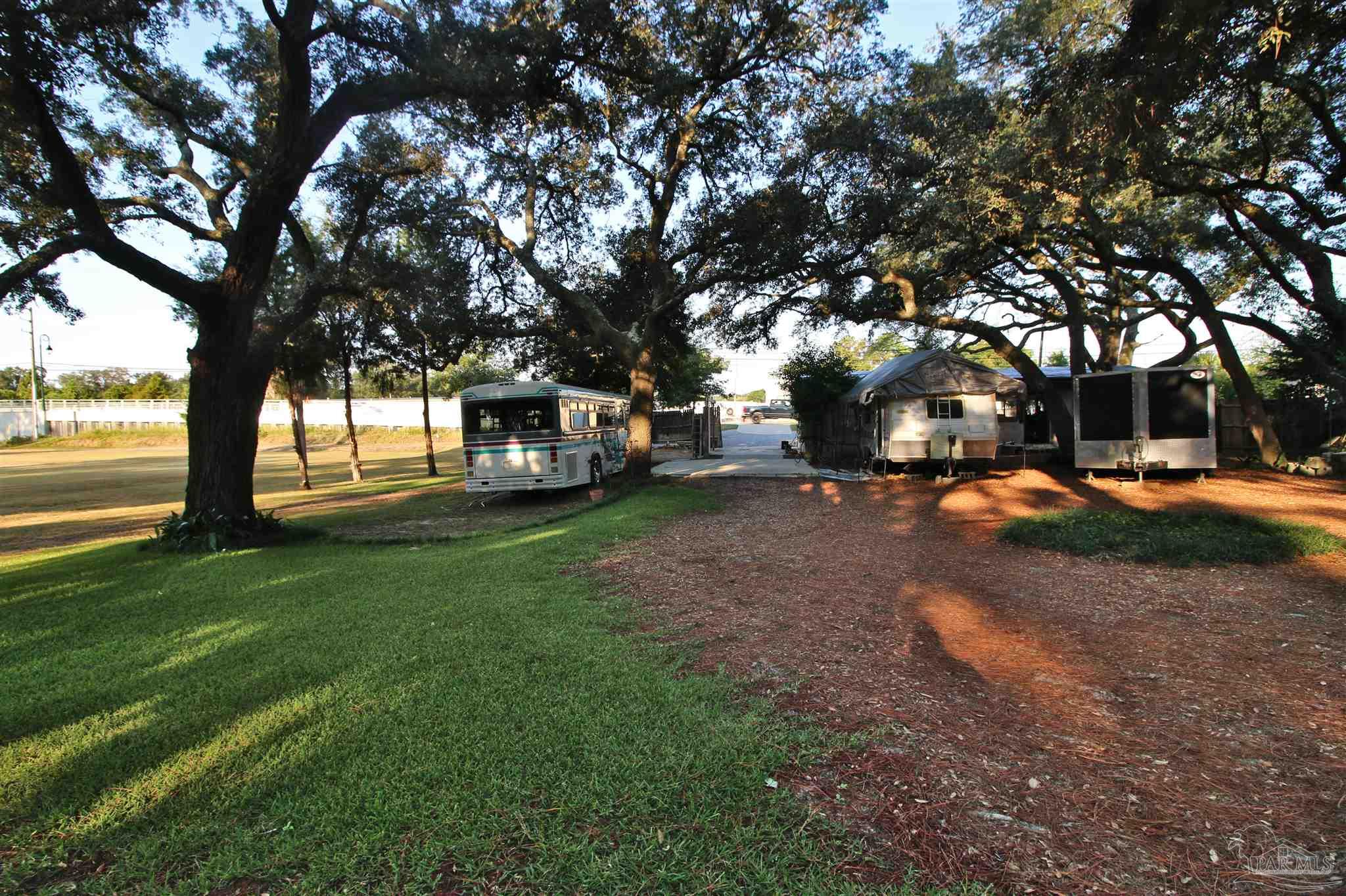610 South Old Corry Field Road Pensacola, FL 32507 - Photo 43 of 72 a view of road with trees