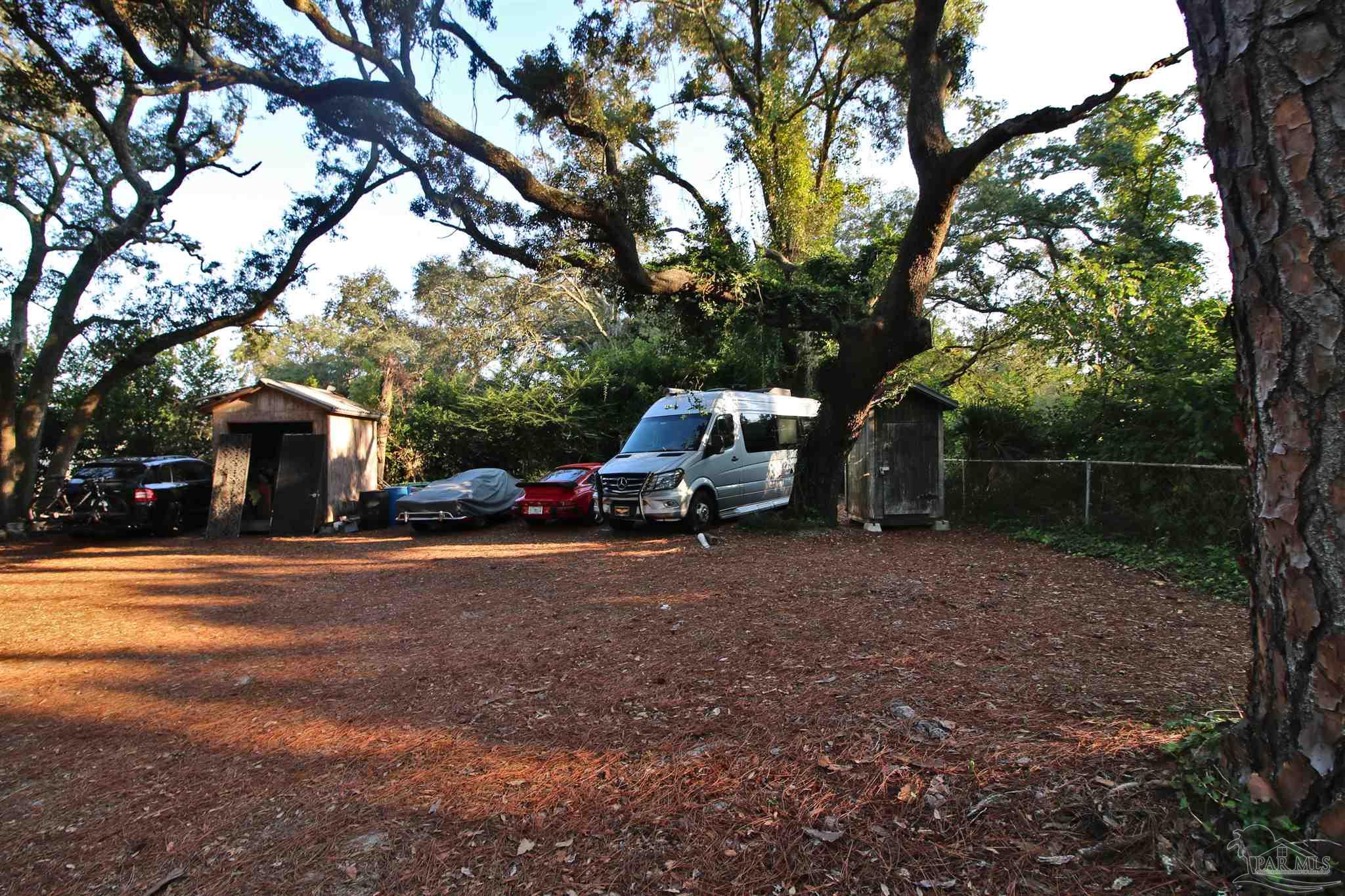 610 South Old Corry Field Road Pensacola, FL 32507 - Photo 45 of 72 a view of street with parked cars