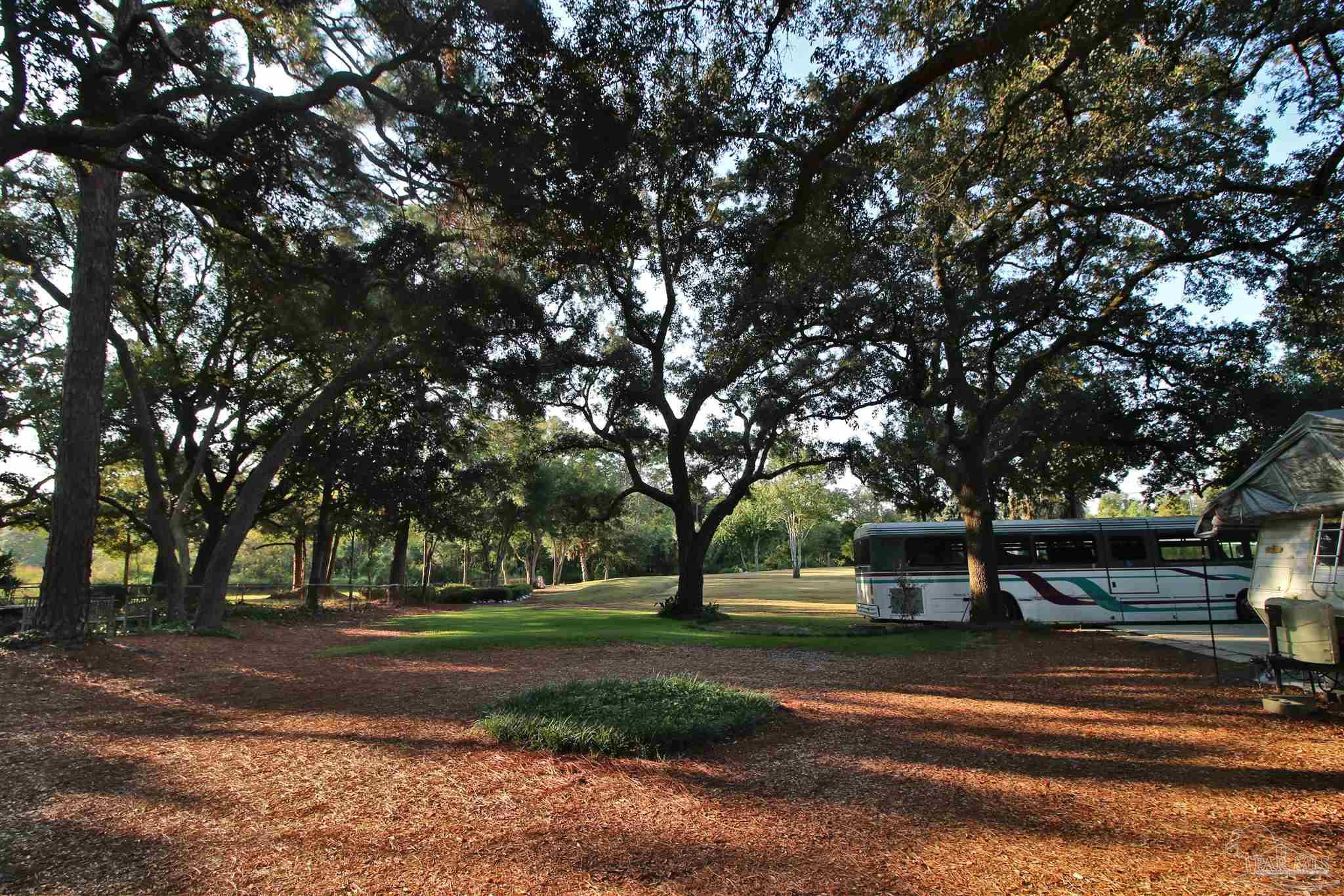 610 South Old Corry Field Road Pensacola, FL 32507 - Photo 46 of 72 a view of street with trees