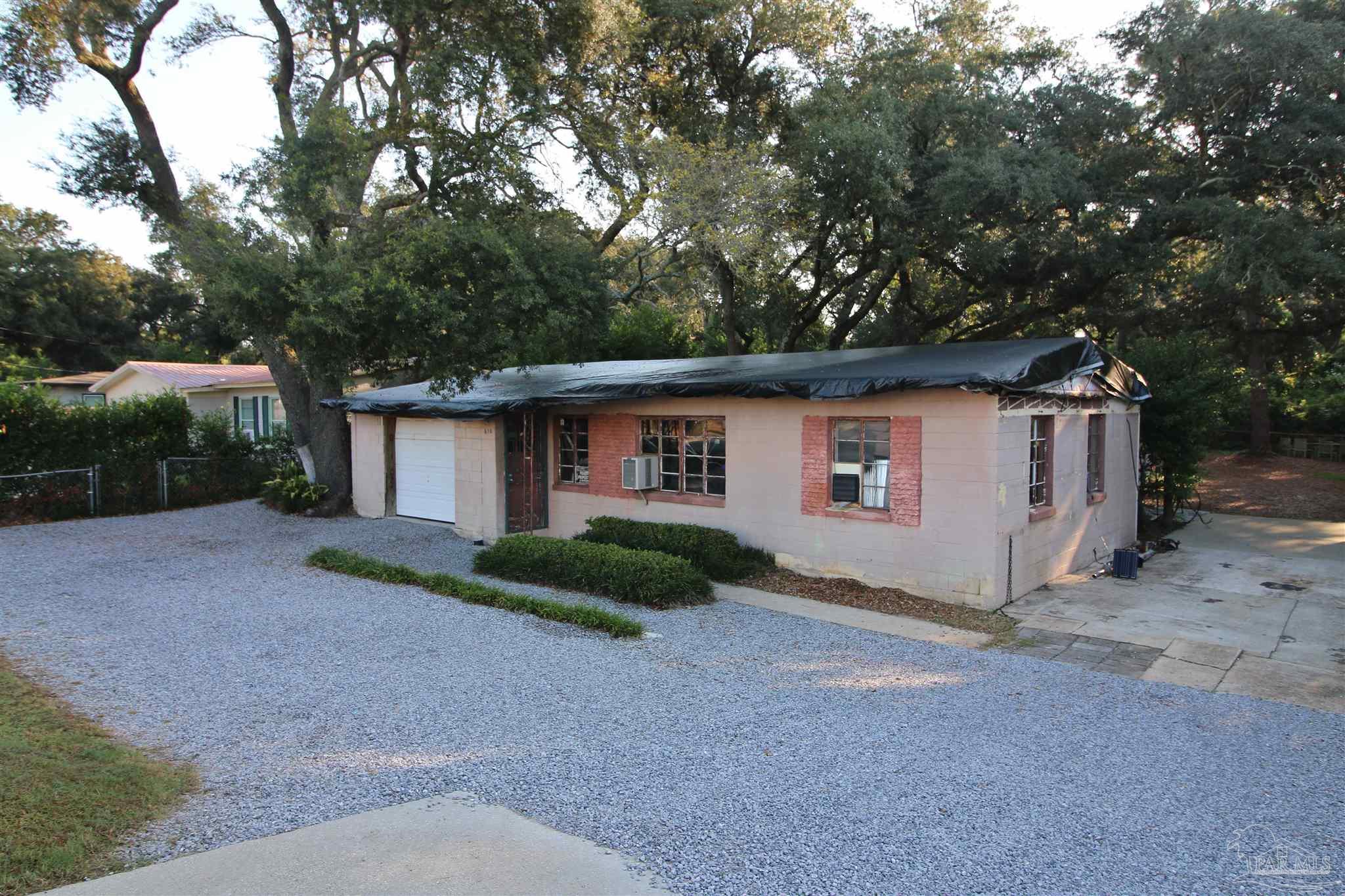610 South Old Corry Field Road Pensacola, FL 32507 - Photo 51 of 72 a view of a house with a yard