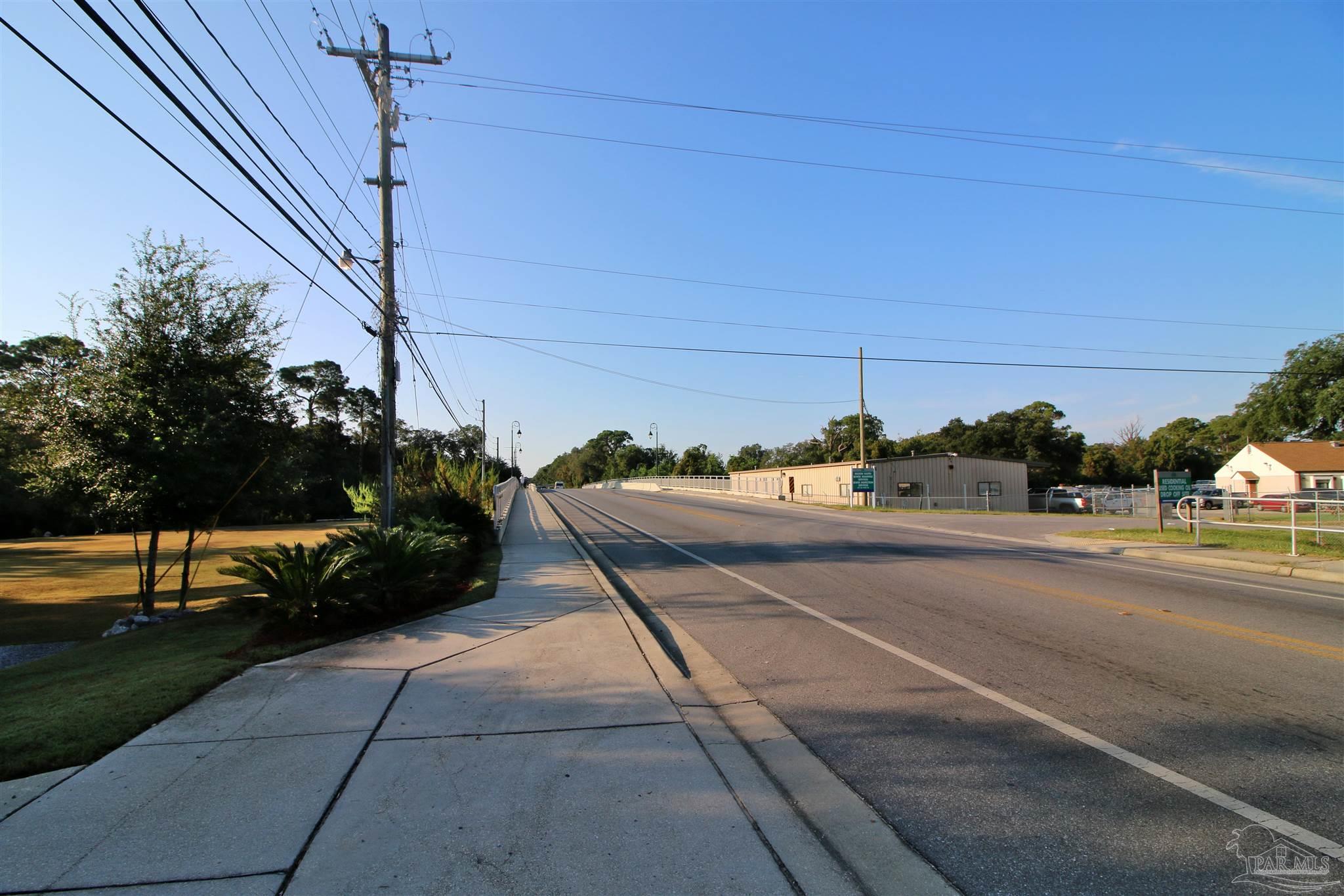 610 South Old Corry Field Road Pensacola, FL 32507 - Photo 52 of 72 a view of a street with houses