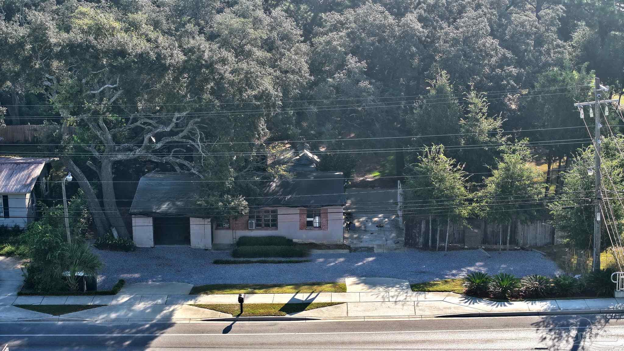 610 South Old Corry Field Road Pensacola, FL 32507 - Photo 7 of 72 a view of yard with tree in it