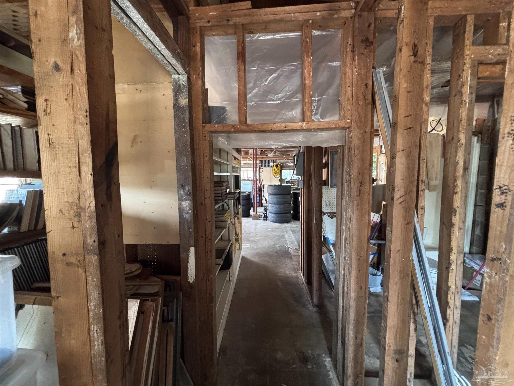 610 South Old Corry Field Road Pensacola, FL 32507 - Photo 71 of 72 a view of a hallway with wooden floor