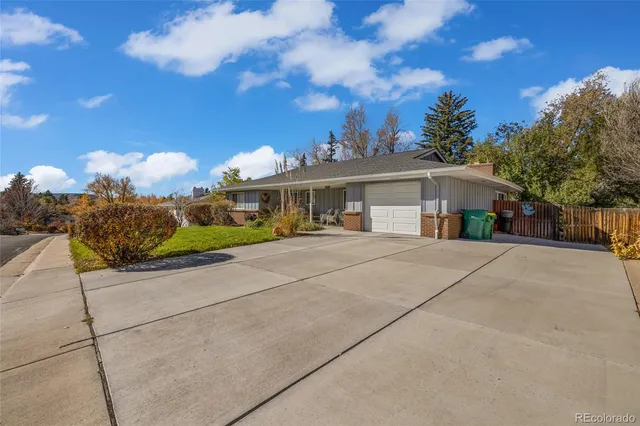 a view of house with outdoor space and street view