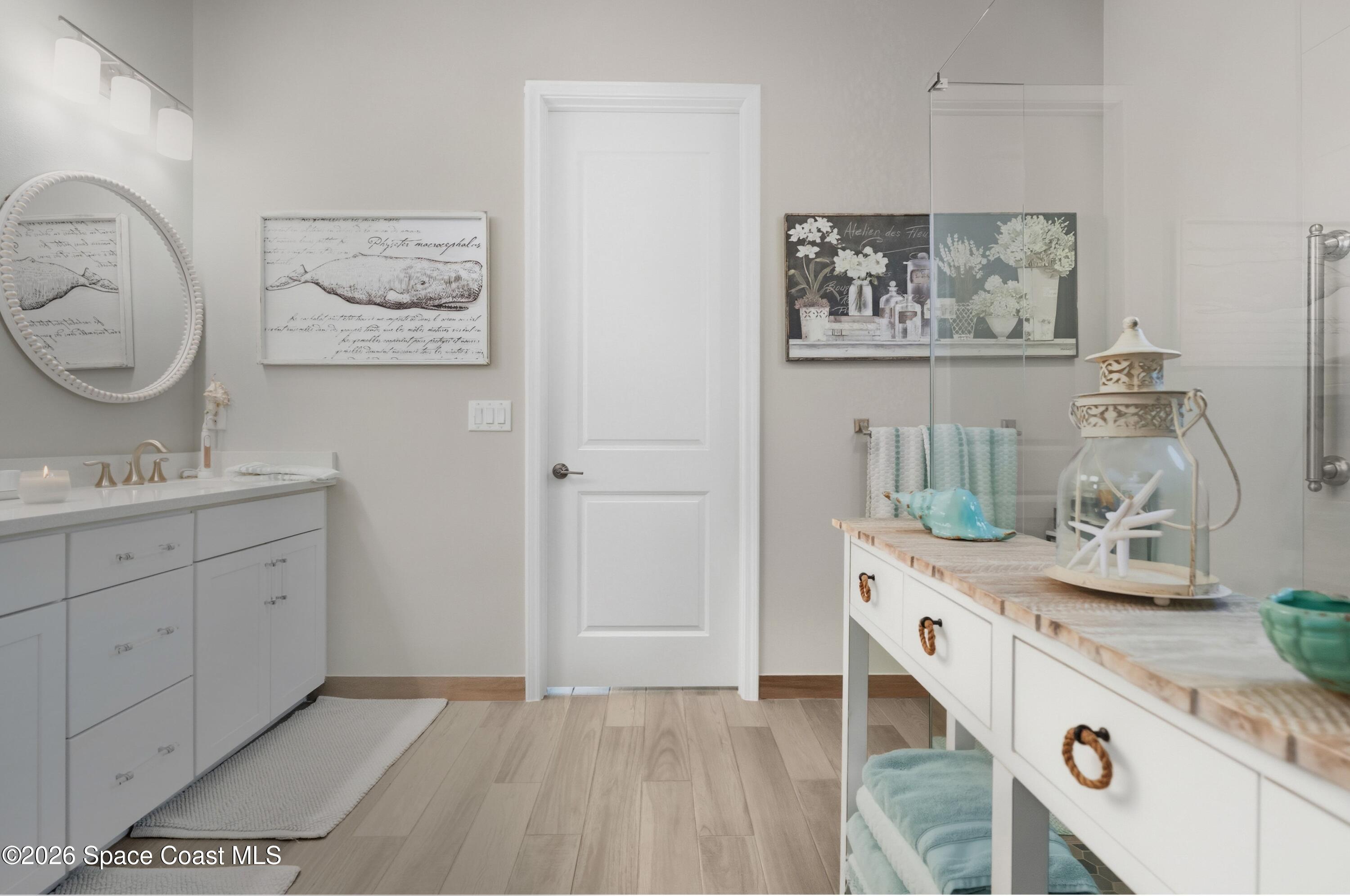 2819 Millennium Circle Melbourne, FL 32940 - Photo 16 of 39 a room with kitchen island a white stove and cabinets